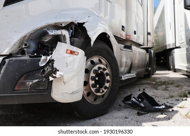 Damage Closeup On White Truck.