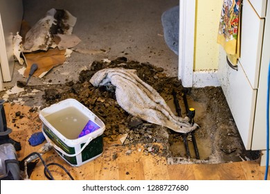 Damage Home Floor In Kitchen, Water Leak Out From Piping System Make Floor Damaged. 