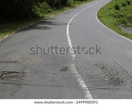 damage to road pavement that needs to be dealt with immediately so that it does not become wider