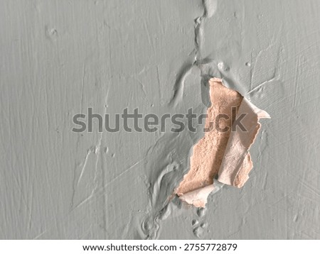 Damage to the wall surface, especially peeling and bubbling paint due to cracks in the outer wall.