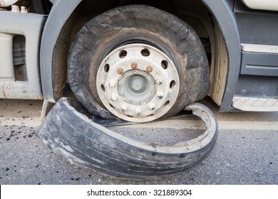 Damaged 18 Wheeler Semi Truck Burst Tires By Highway Street.