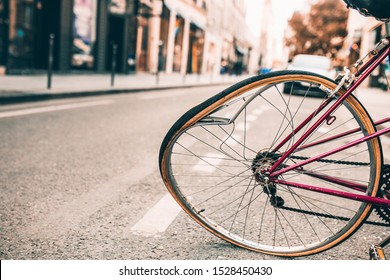 Damaged bicycle with a bent wheel during a road accident collision