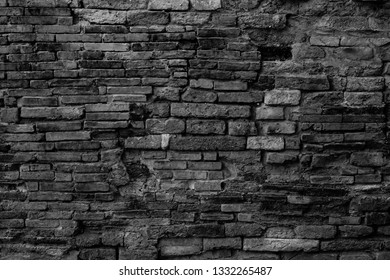 Damaged brick black wall background