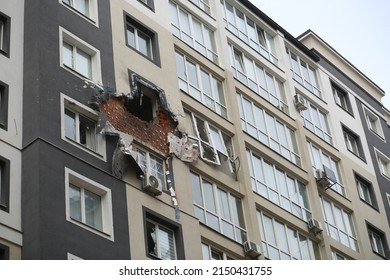 Damaged Building Facade After Heavy Artillery Shooting And Shelling