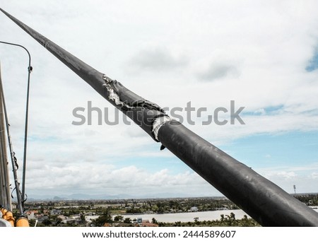 damaged cables of a cable stayed bridge through tough time