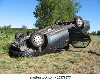 Damaged Car After The Traffic Accident, Turned Overhead