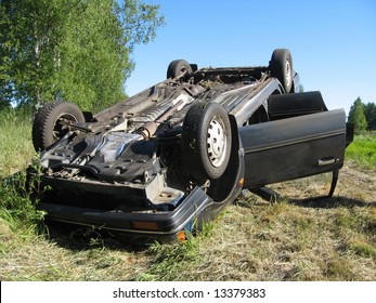 Damaged Car After The Traffic Accident, Turned Overhead