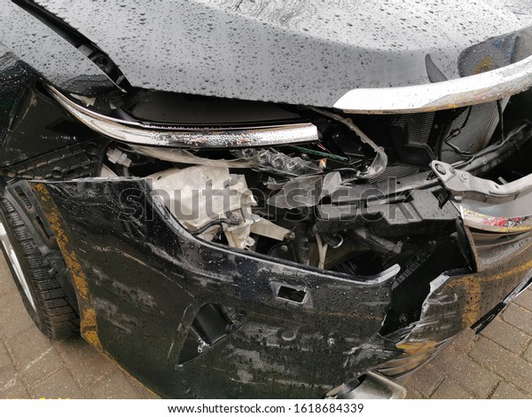 Damaged Car with Dents from the Accident, Car\
after an Head on\
Collision