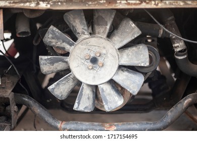 Damaged Car. Dents On The Machine Body. Rust And Scratches. A Deflated Wheel And Other Parts Requiring Repair By A Vehicle.