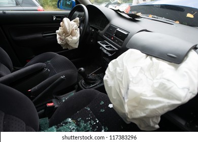 Damaged Car With Deployed Airbags