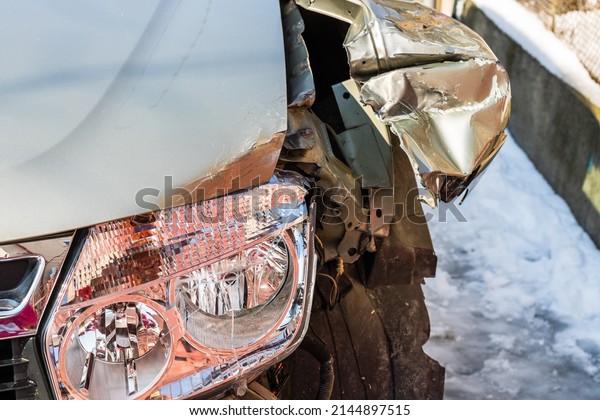 Damaged car detail on crushed car, wrecked vehicle.\
Bucharest, Romania,\
2022