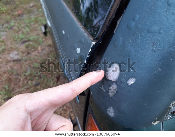 The damaged\
car paint. The old car paint\
cracked
