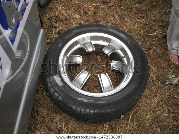 Damaged car wheels Isolated from the car Come out\
as a wheel piece