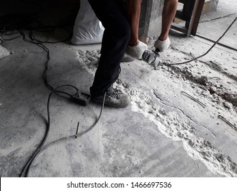 Damaged Cement Floor See Broken Steel Bars And Electric Drills Have To Repair The New Floor To Use	