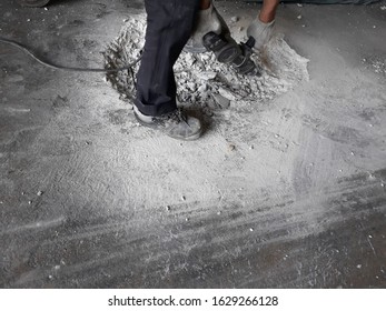 Damaged Cement Floor See Broken Steel Bars And Electric Drills Have To Repair The New Floor To Use	