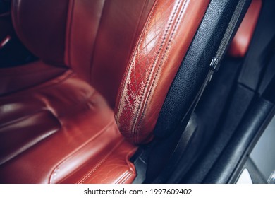 Damaged Leather Car Seat. Car Interior