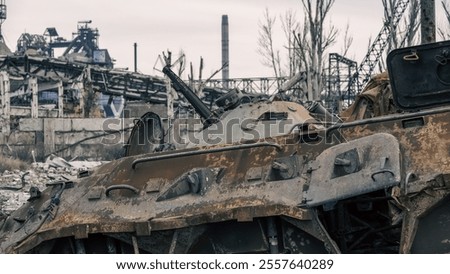 Similar – Foto Bild beschädigter Militärpanzer auf einer Straße in der Ukraine