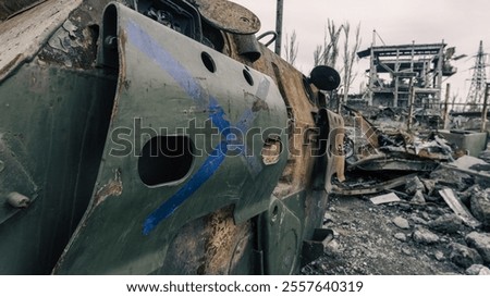 Similar – Foto Bild beschädigter Militärpanzer auf einer Straße in der Ukraine