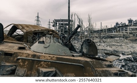 Similar – Foto Bild beschädigter Militärpanzer auf einer Straße in der Ukraine