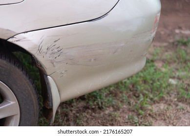 Damaged Old Gold Car Side View