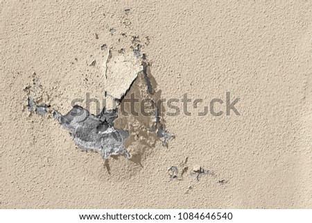 Damaged outdoor wall.