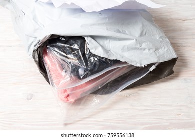 Damaged Package, Clothing Bag