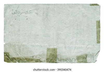 Damaged paper blank with torn edges isolated on white background. Vintage texture.