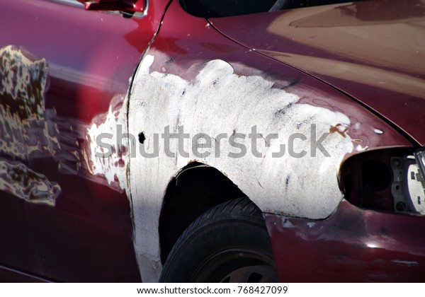 damaged part of the\
car in a car collision