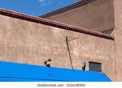 A Damaged Pueblo Style Commercial Building