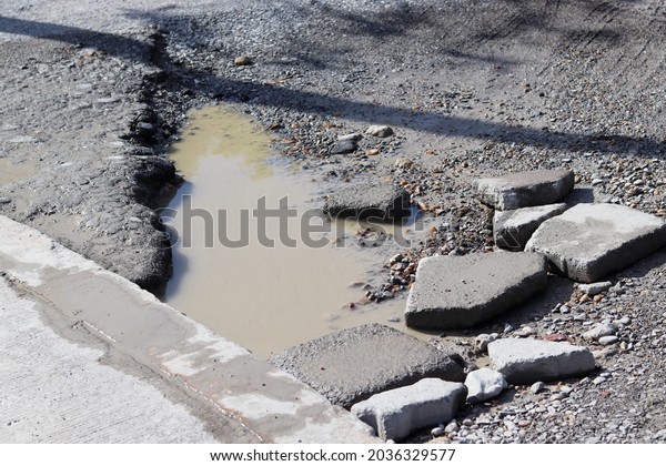 Damaged roads, flooded  It is dangerous to\
cause an accident.