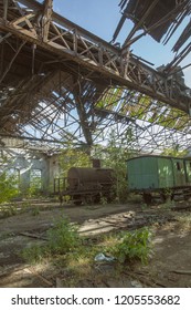 Damaged Roof In Abandoned Red Star Train Graveyard Hall