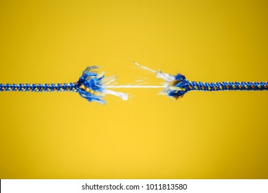 Damaged rope - tension, stress and risk concept - Shutterstock ID 1011813580