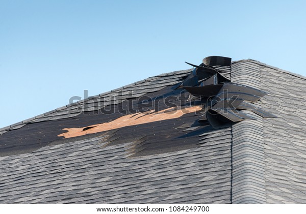 Damaged shingle\
roof