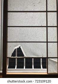 Damaged Shoji door - japanese paper covered door