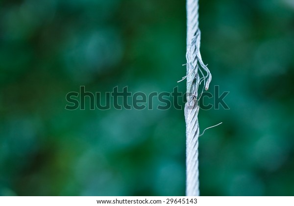 damaged steel cable.\
shallow depth of view.