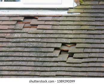 Damaged Tiles On A Pitched Roof