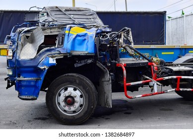 Damaged Vehicle Close Up After The Truck Trailer Crash.