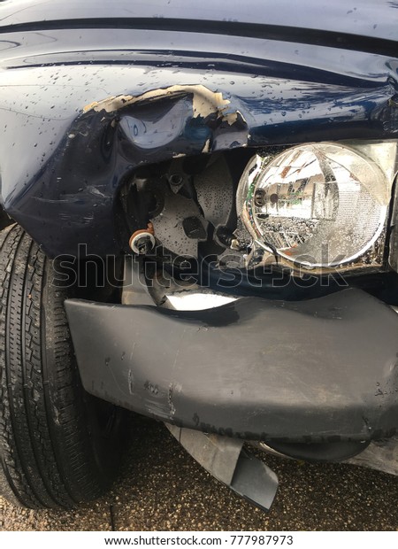Damaged and wrecked pick up truck was involved\
in an accident and\
collision