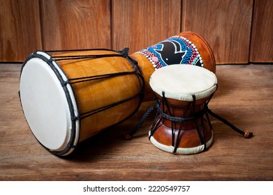 Damaru and djembe drums, percussion and musical instruments.