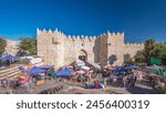 Damascus Gate or Shechem Gate timelapse hyperlapse, one of the gates to the Old City of Jerusalem, Israel. Crowd of people near entrance