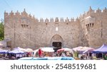 Damascus Gate or Shechem Gate timelapse hyperlapse, one of the gates to the Old City of Jerusalem, Israel. Crowd of people near market