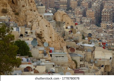 Damascus, Syria. December 12th 2005 
Satellite Dishes And Informal Housing On The Slopes Of Mount Qasyun, Overlooking The Syrian Capital, Damascus, Syria.  
