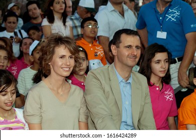 Damascus, Syria. July 2nd 2009 
Bashar Al Assad And Asma Al Assad Attending A Charity Event In Damascus Syria.
