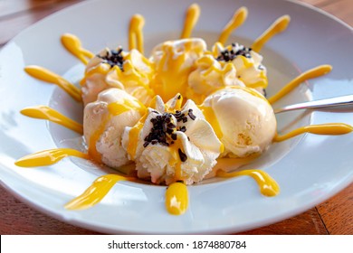 Dame blanche is the name used in Belgium and the Netherlands for a sweet dessert consisting of vanilla ice cream with whipped cream and warm molten chocolate, Dessert is similar to the American sundae - Shutterstock ID 1874880784
