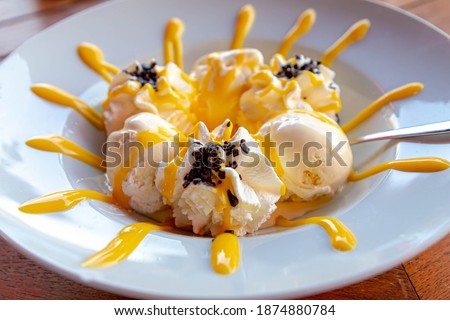 Dame blanche is the name used in Belgium and the Netherlands for a sweet dessert consisting of vanilla ice cream with whipped cream and warm molten chocolate, Dessert is similar to the American sundae