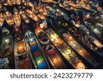 Damnoen Saduak Floating Market or Amphawa. Local people sell fruits, traditional food on boats in canal, Ratchaburi District, Thailand. Famous Asian tourist attraction destination. Festival in Asia.