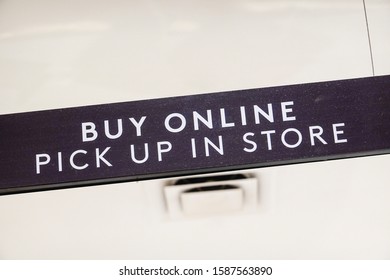 Danbury, Ct, USA June 10, 2019 A Sign At A Clothing Store Urging People To Shop Online First And Pick Up In Store After.