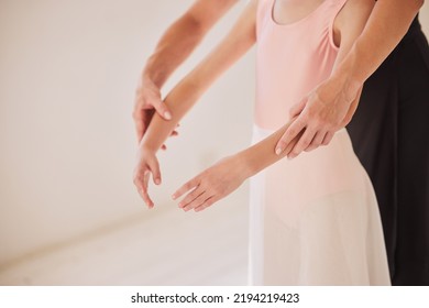 Dance, Art And Ballet Teacher With Girl Ballerina Practicing Posture In A Creative Studio. Child Classical Dancer Training With An Instructor For A Recital Show. Elegant Student Dancing At A School.