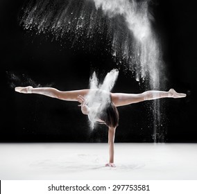 dance, ballet, beauty - ballerina dancing with flour