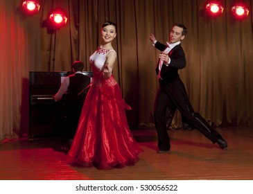 Dance beautiful couple dancing ballroom dancing on dark background